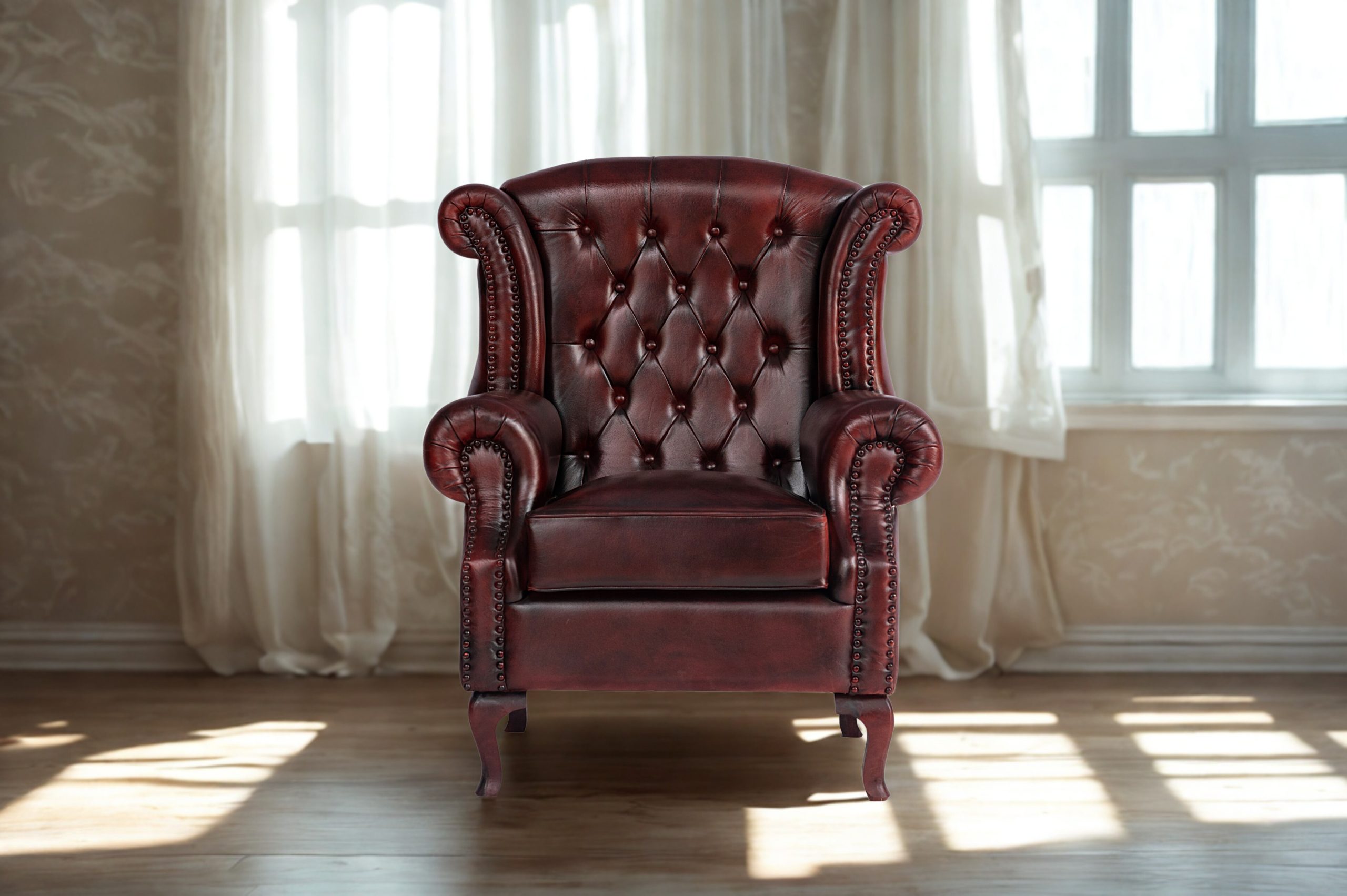 Red Leather Wingback Armchair with high back and plush seating by RS Woodworking