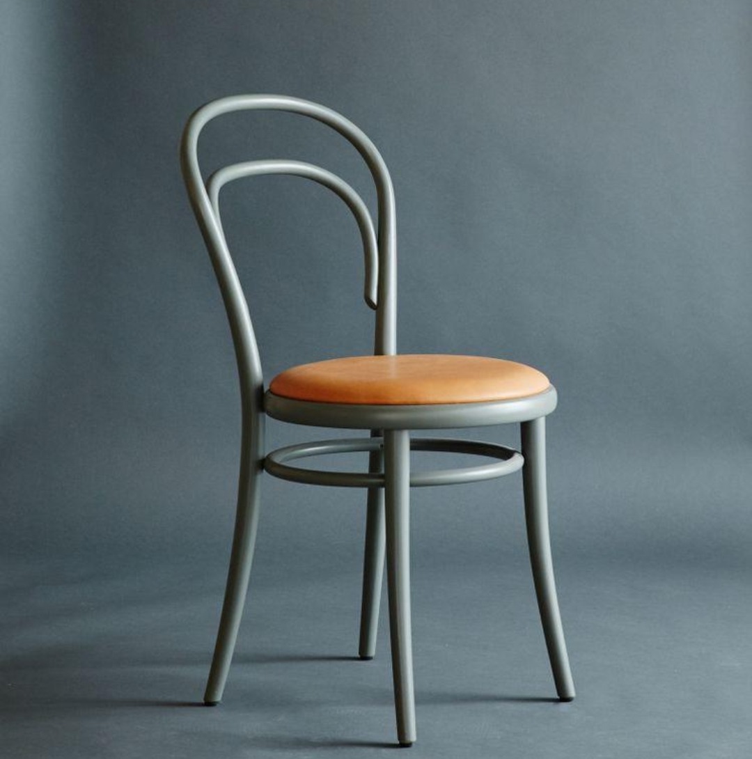 Minimalist Metal Chair with cushioned seat and durable frame by RS Woodworking